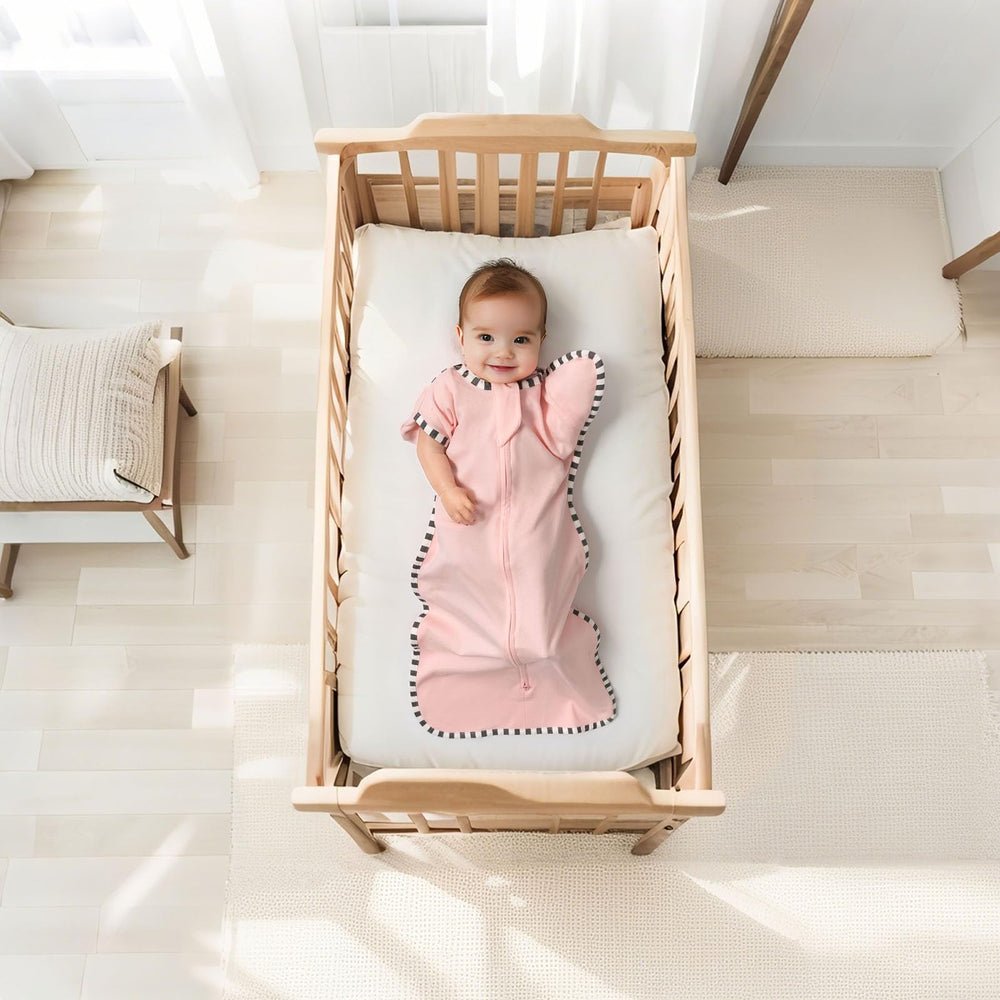 QUENESS Transition Swaddle breathable cotton fabric for gentle skin comfort.