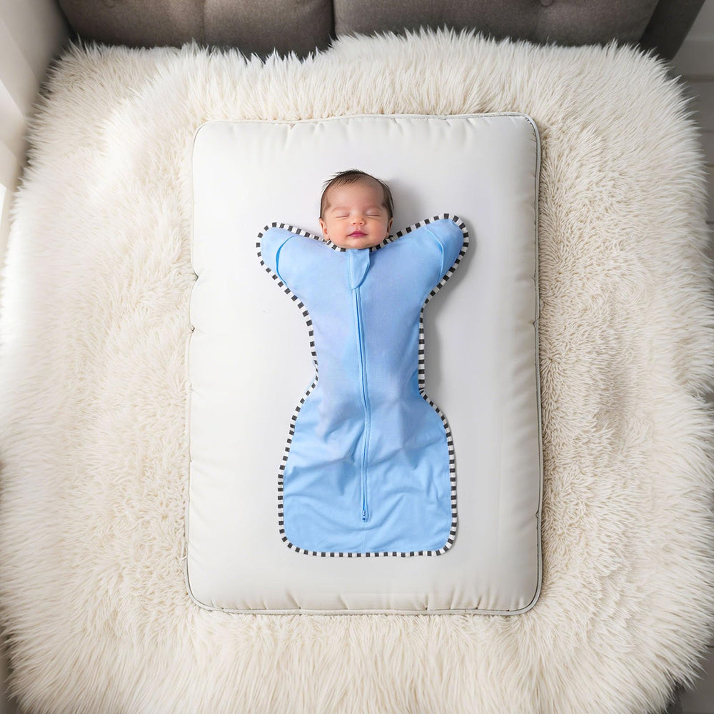 Queness Transition Swaddle smooth two-way zipper for easy diaper changes