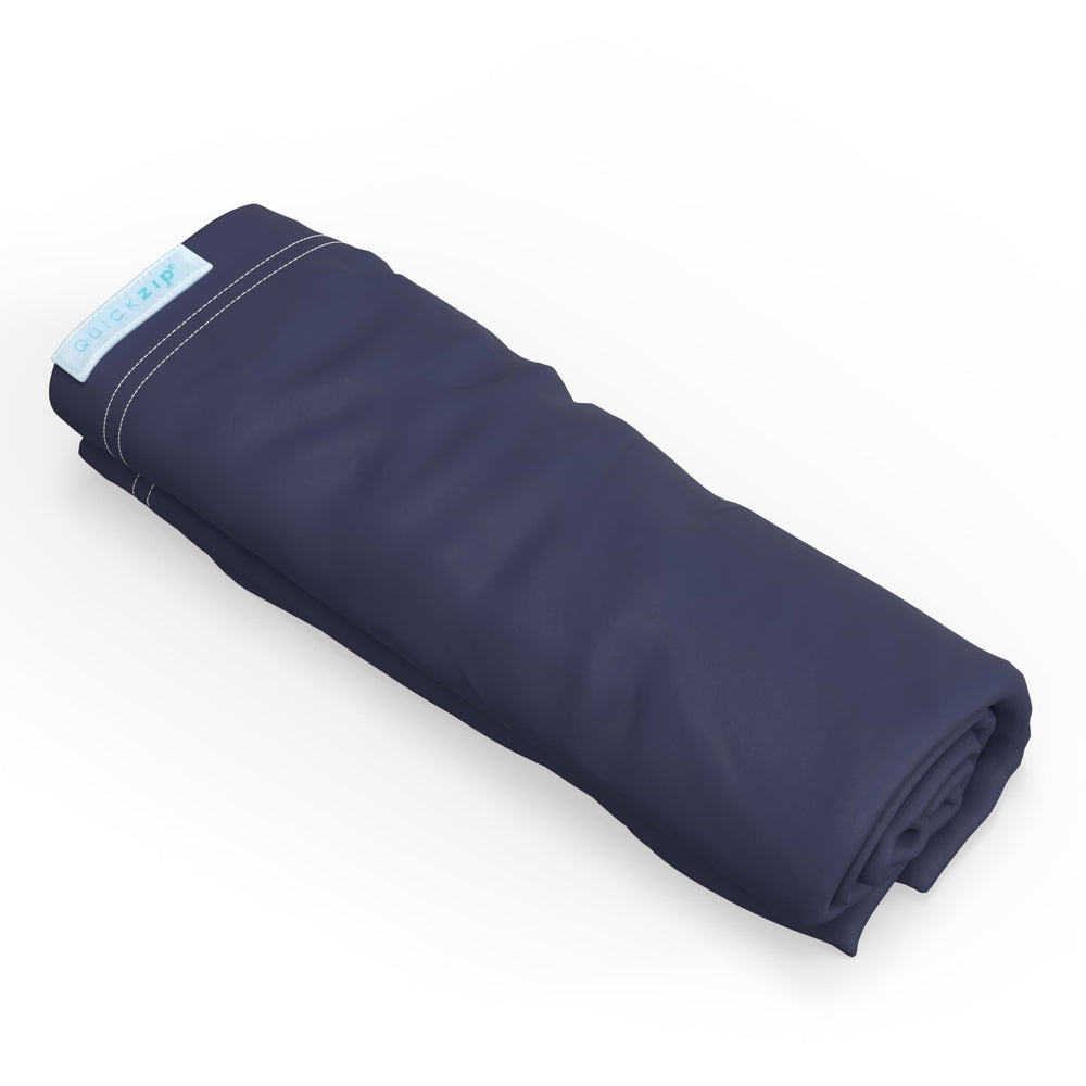 QuickZip Deep Navy Zip-On Sheet closeup in soft cotton for baby comfort