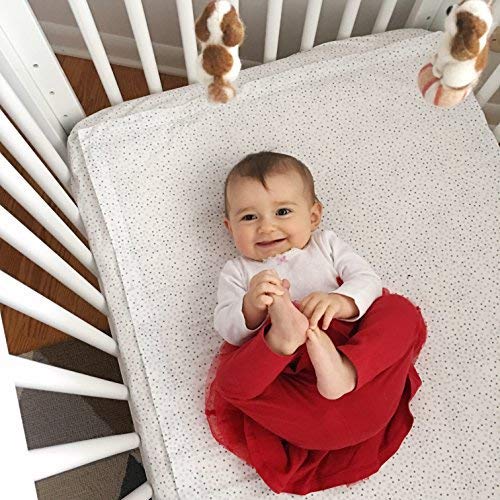 QuickZip fits all standard cribs, compatible with flat mattress pads.