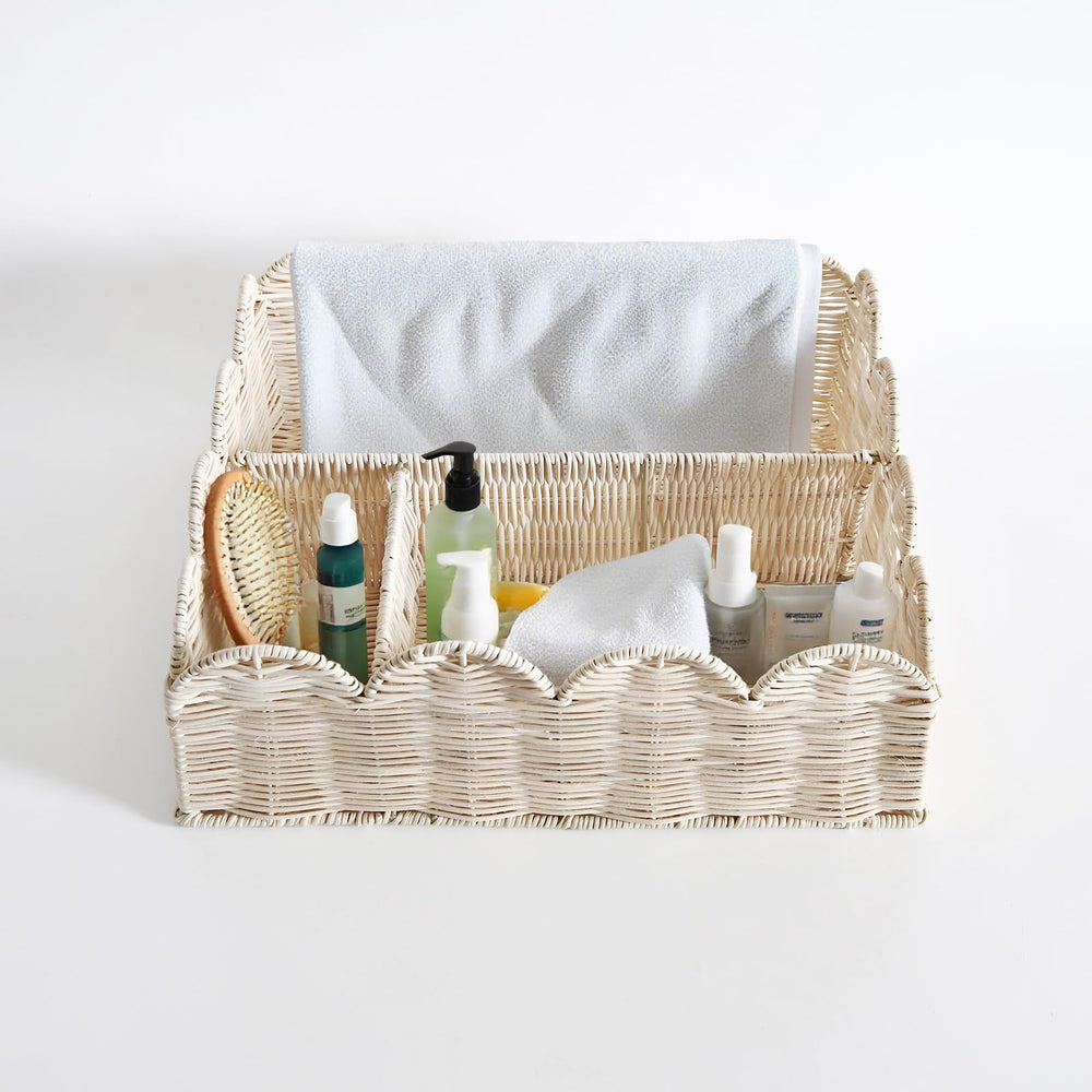 Quincry scalloped wicker baby caddy adds stylish storage for essentials.