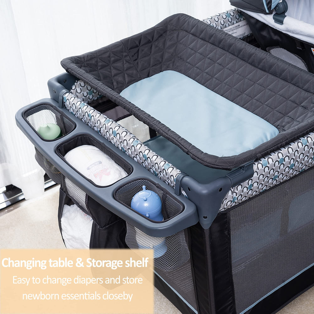 QUTANIX newborn napper with canopy providing shaded sleep space.