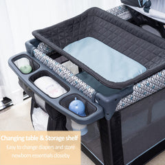 QUTANIX newborn napper with canopy providing shaded sleep space.