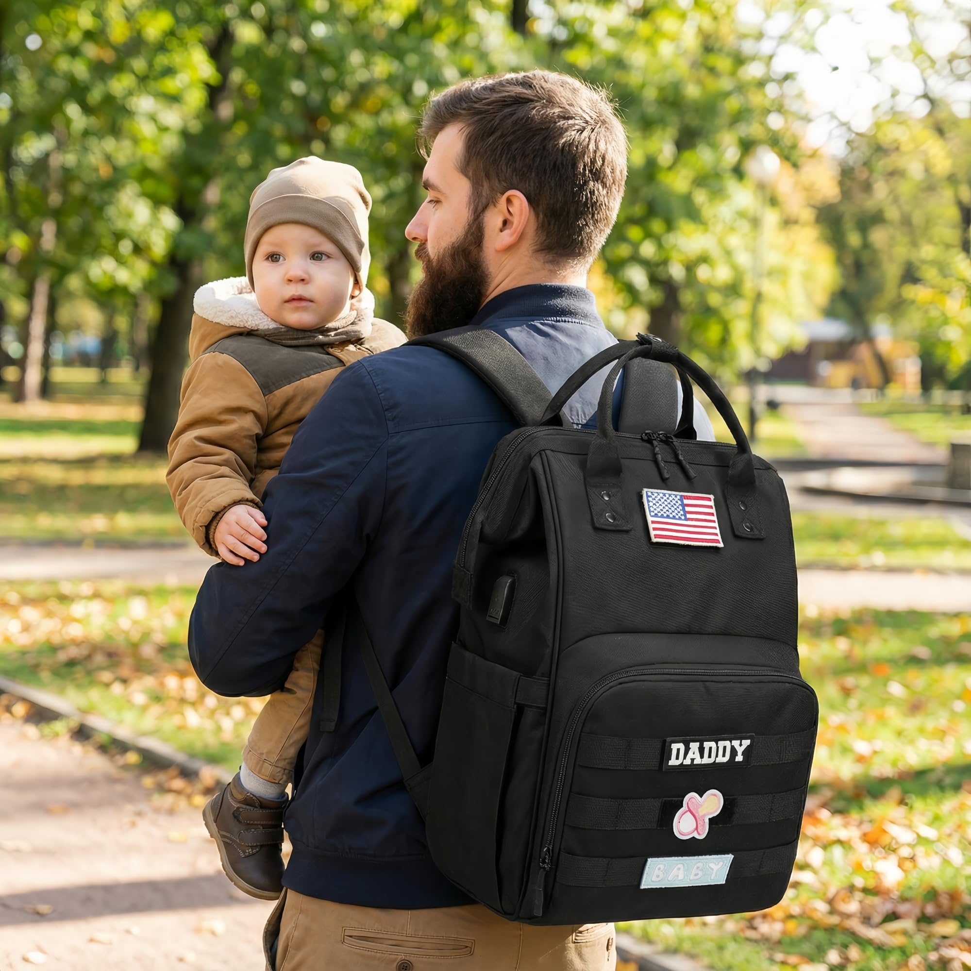 QWREOIA diaper bag backpack key holder included for quick-access items.