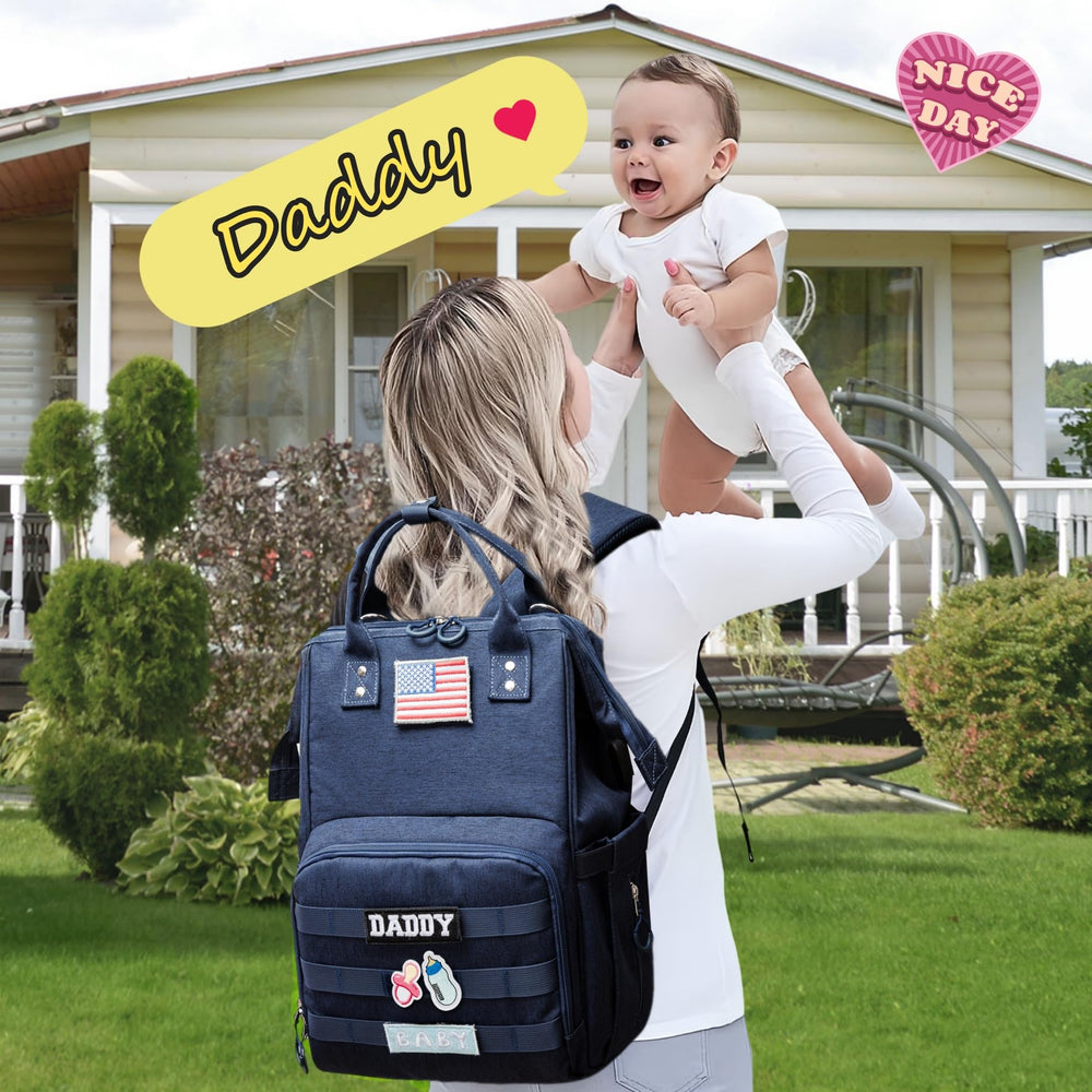 QWREOIA diaper bag organization pockets, 14 compartments keeping items neatly arranged.