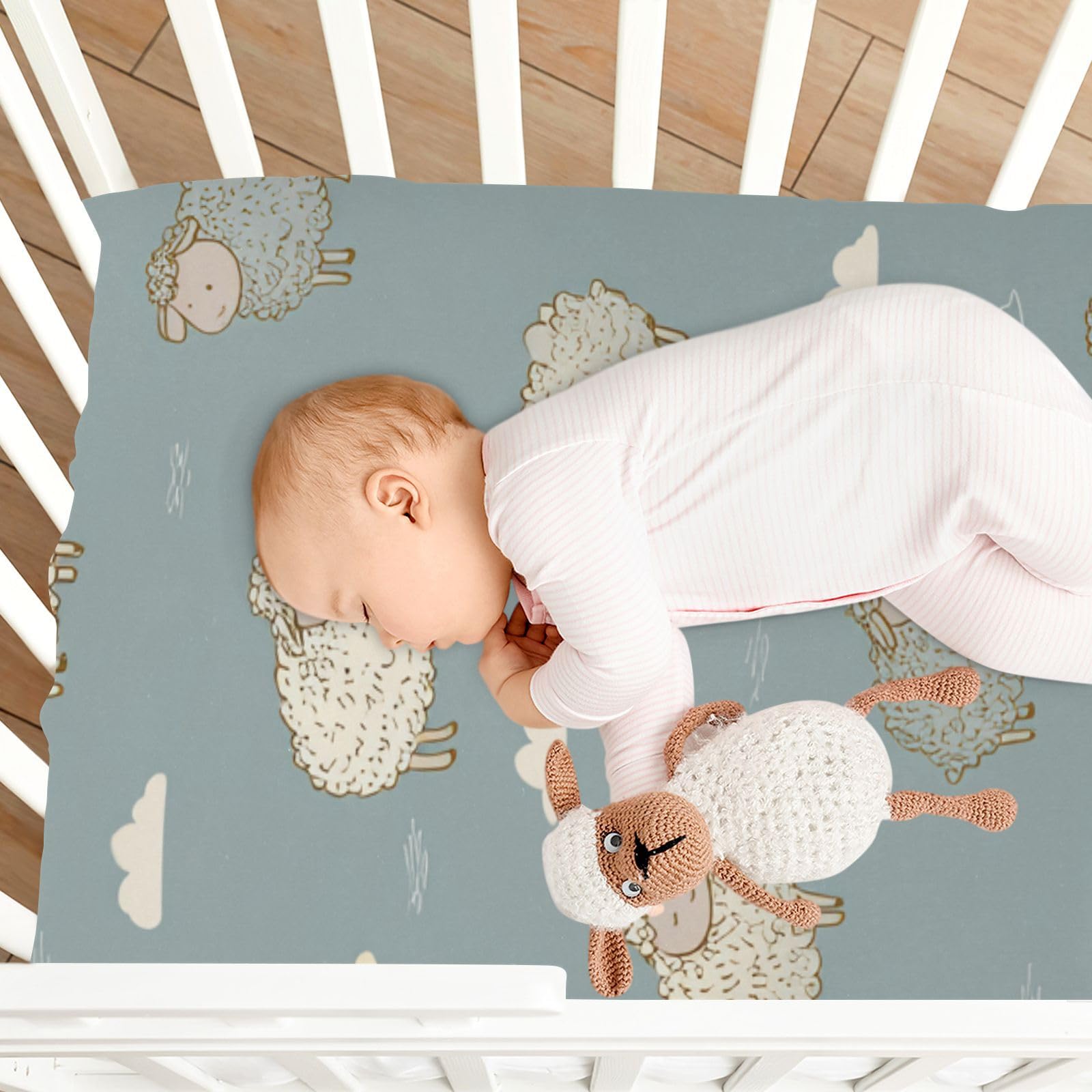 QwThum Breathable fabric crib sheet designed for comfortable daytime naps.