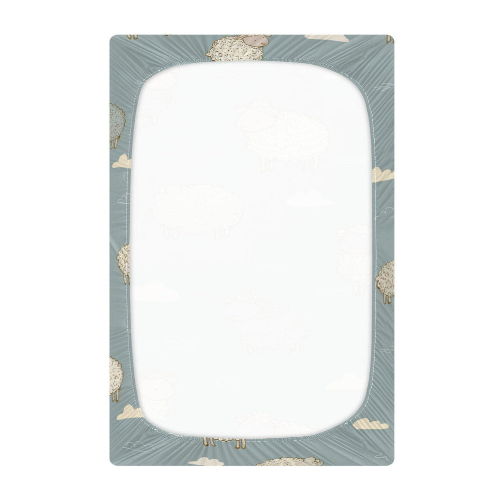 QwThum Deep-pocket elastic-trim crib sheet close-up demonstrating secure edge.