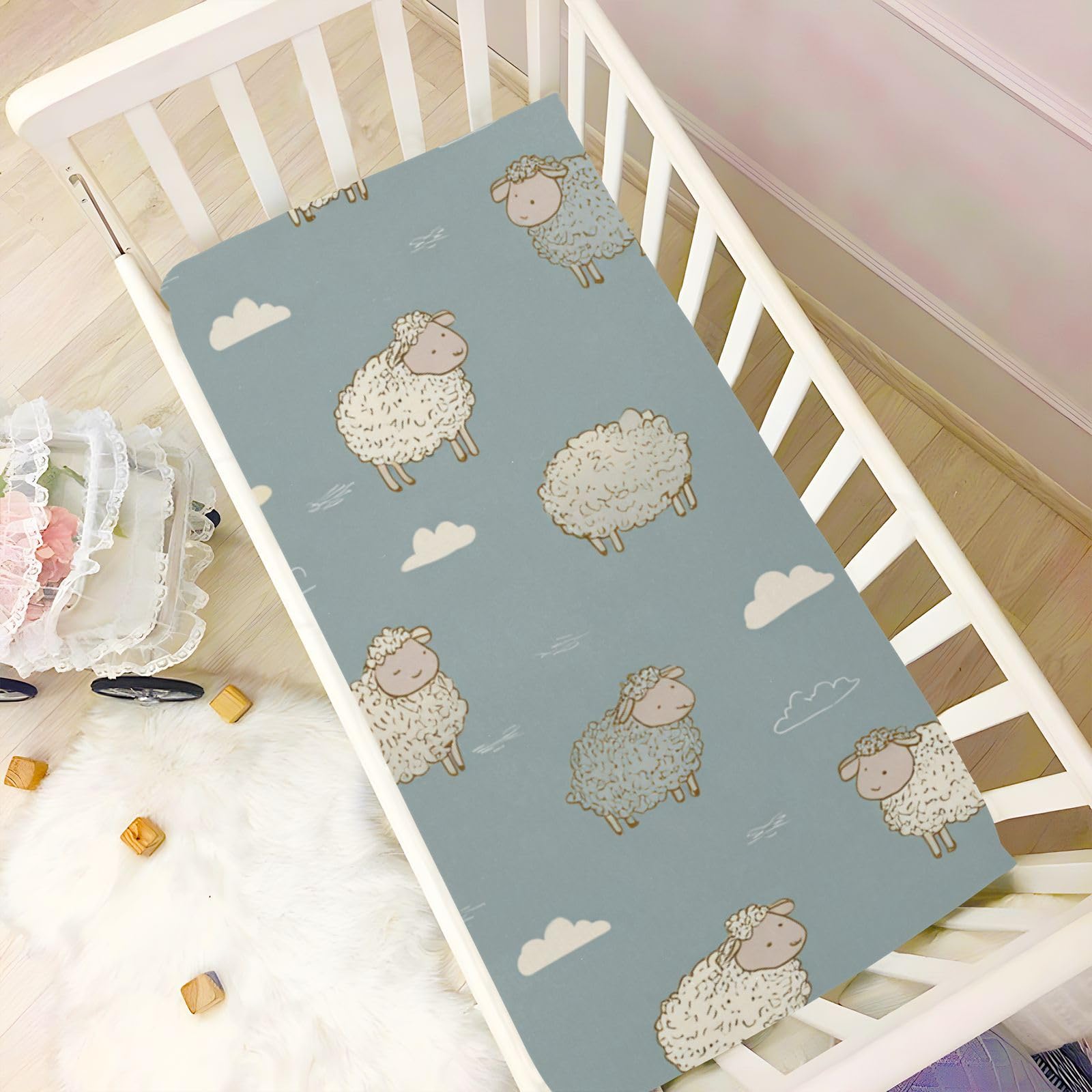 QwThum Machine-washable microfiber crib sheet aftercare demonstration.