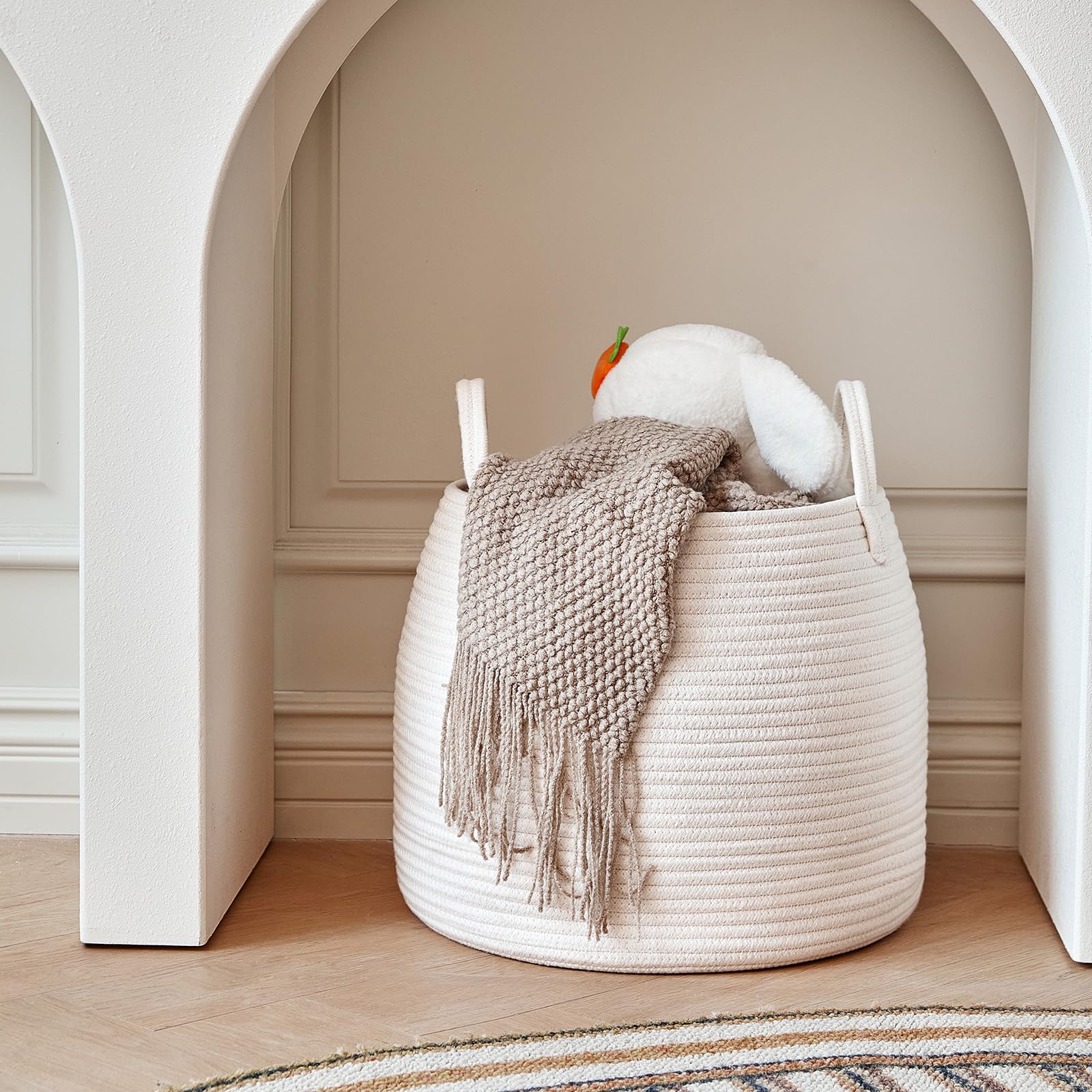 R RUNKA basket holds blankets and plush pillows without losing its shape