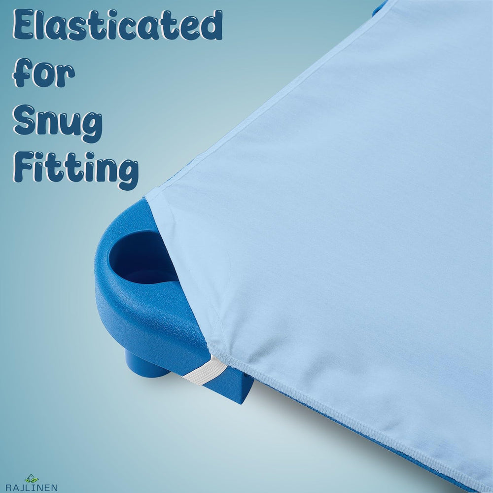 Rajlinen corner elastic loops ensure a snug, slip-free fit on standard cots.