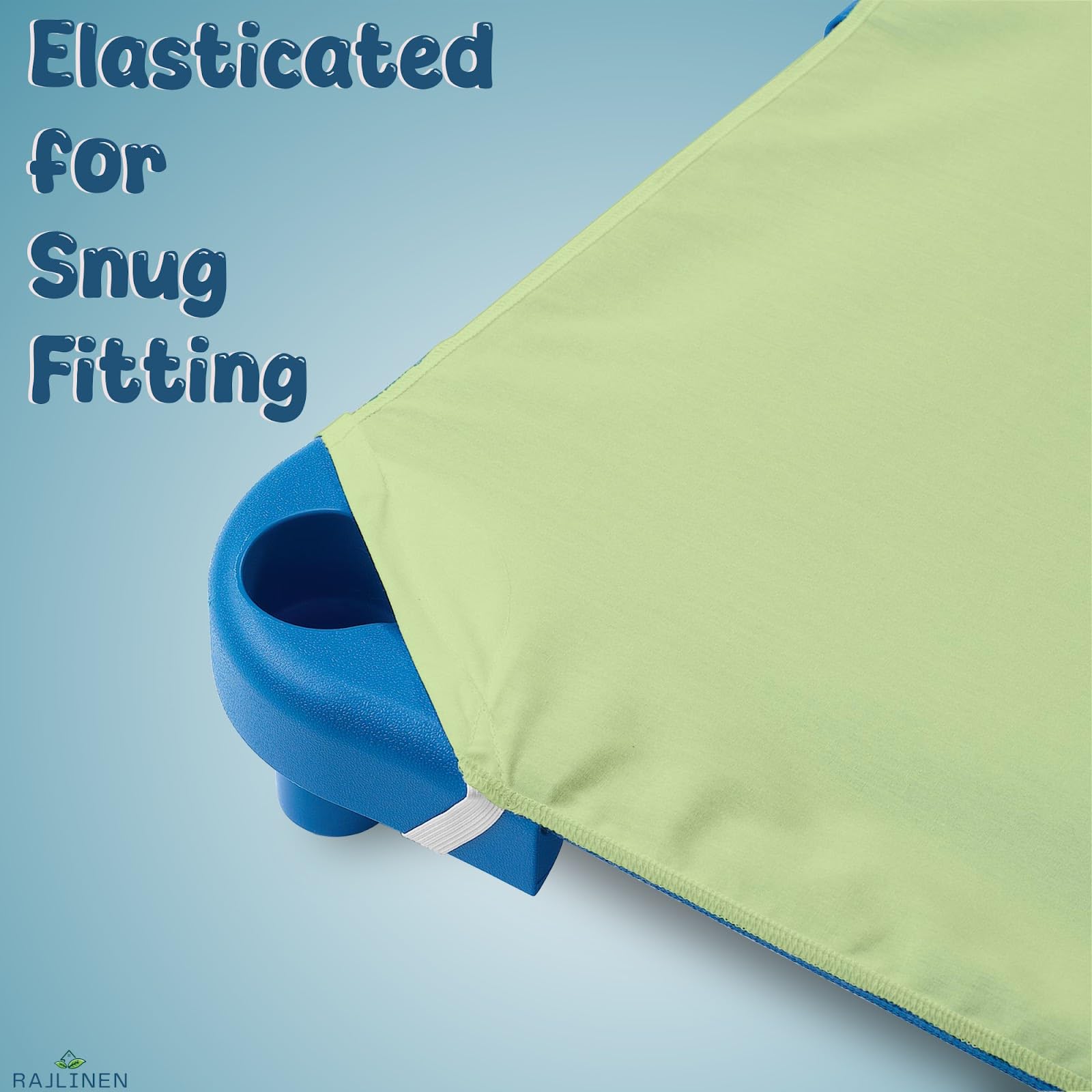 Close-up of Rajlinen microfiber texture, sage cot sheet feels soft and breathable.