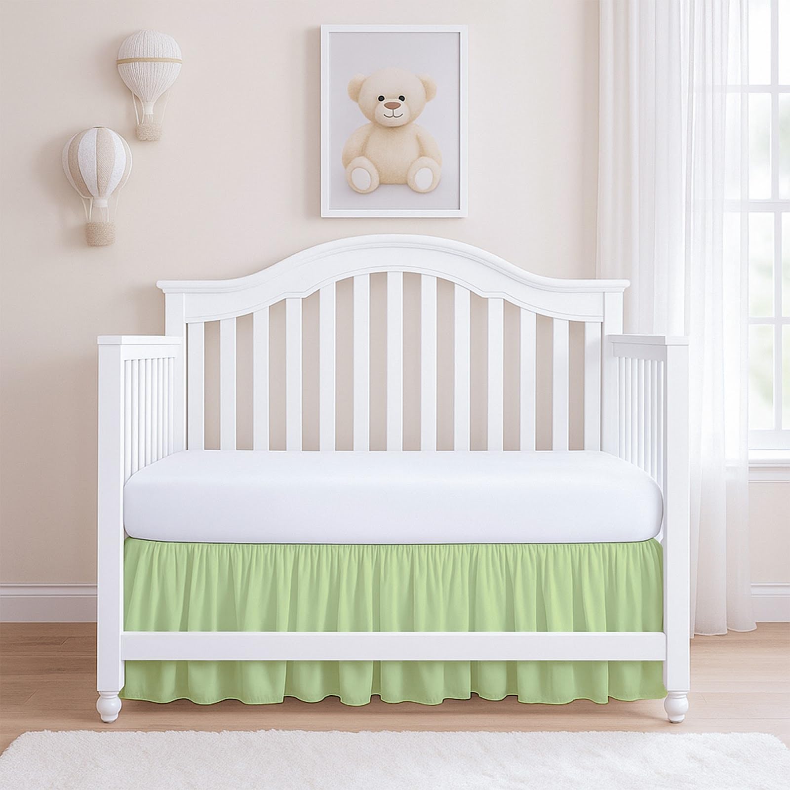 Rajlinen microfiber ruffled crib skirt texture adds softness to the nursery.
