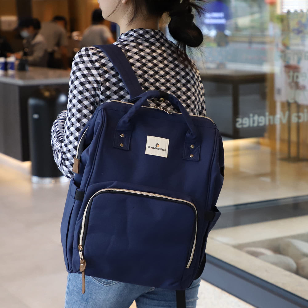 Ramhorn blue diaper bag backpack with side pocket for bottles.