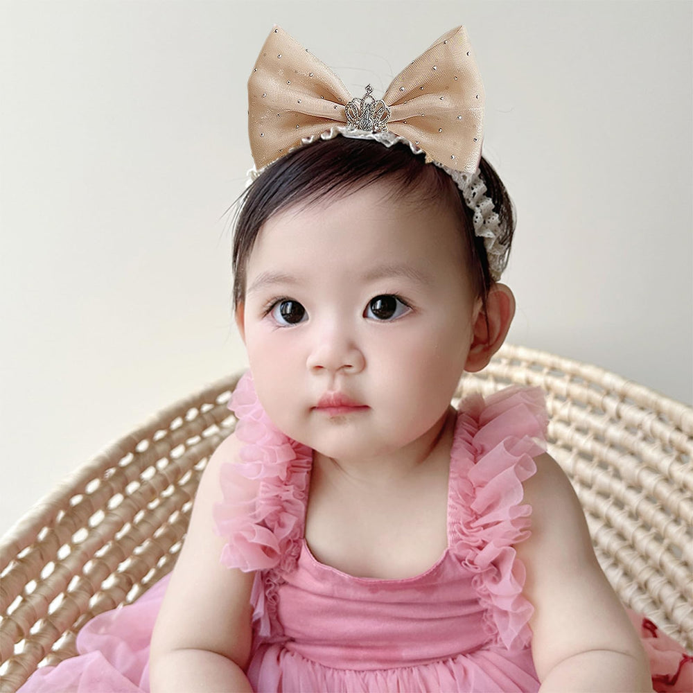 Rannyrena birthday party hair accessory enhances festive outfits.
