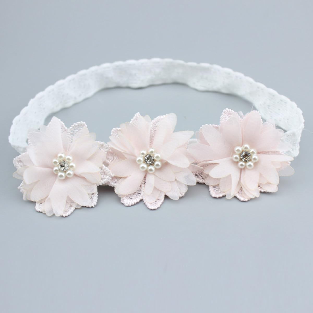 Rannyrena embroidered floral detail adds subtle style for photos.