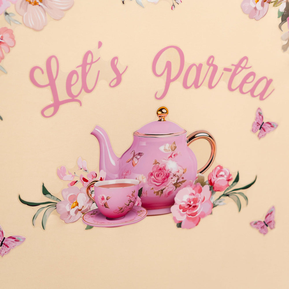 Raoformi Let's Par-Tea decal featuring roses and butterflies enhances a photo-ready backdrop.
