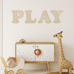 Versatile playroom letters rest on shelf for easy styling