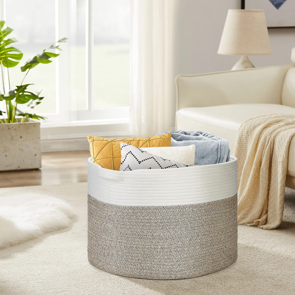 Ravinte Blanket Basket with reinforced handles for effortless movement between rooms.