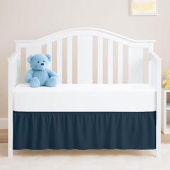 Ready To Rest navy blue crib skirt with 14-inch drop hides under-crib storage and finishes the nursery look