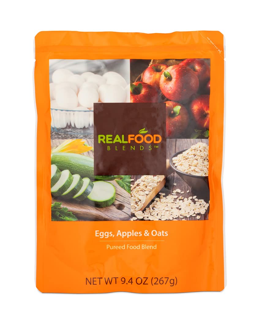 Real Food Blends ingredients close-up: eggs zucchini olive oil apples oats.