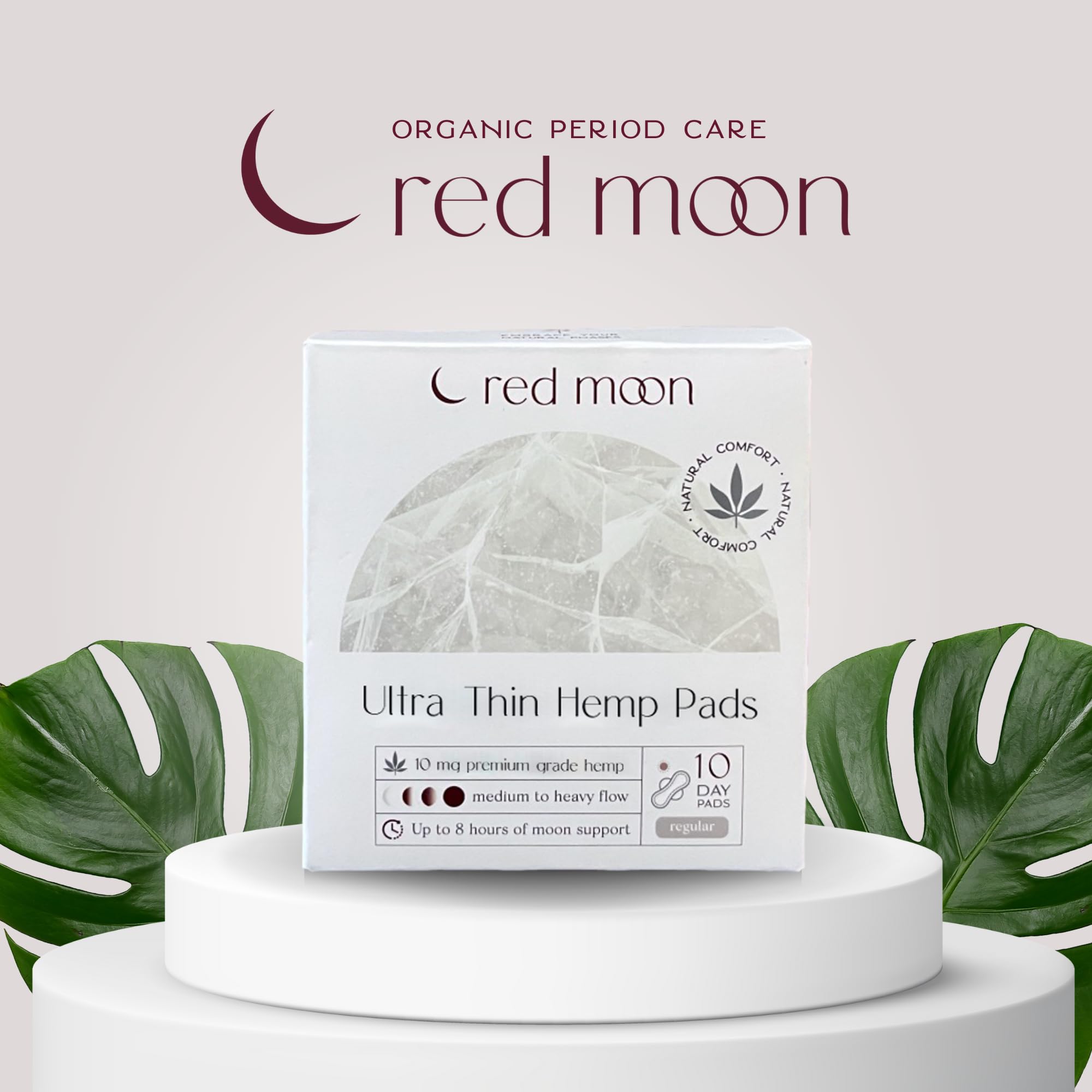 Red Moon pads with wings close-up show secure, winged protection for active days