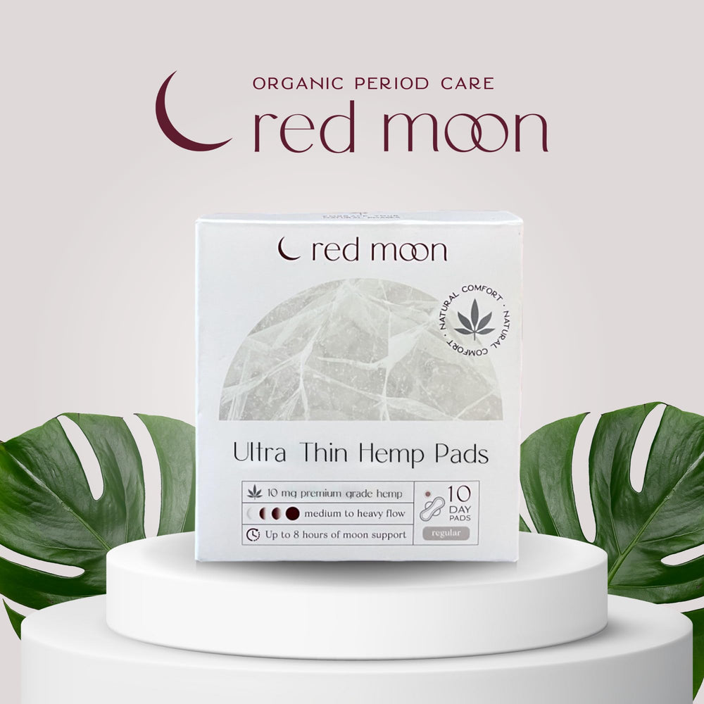 Red Moon pads with wings close-up show secure, winged protection for active days