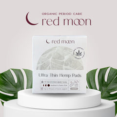 Red Moon pads with wings close-up show secure, winged protection for active days