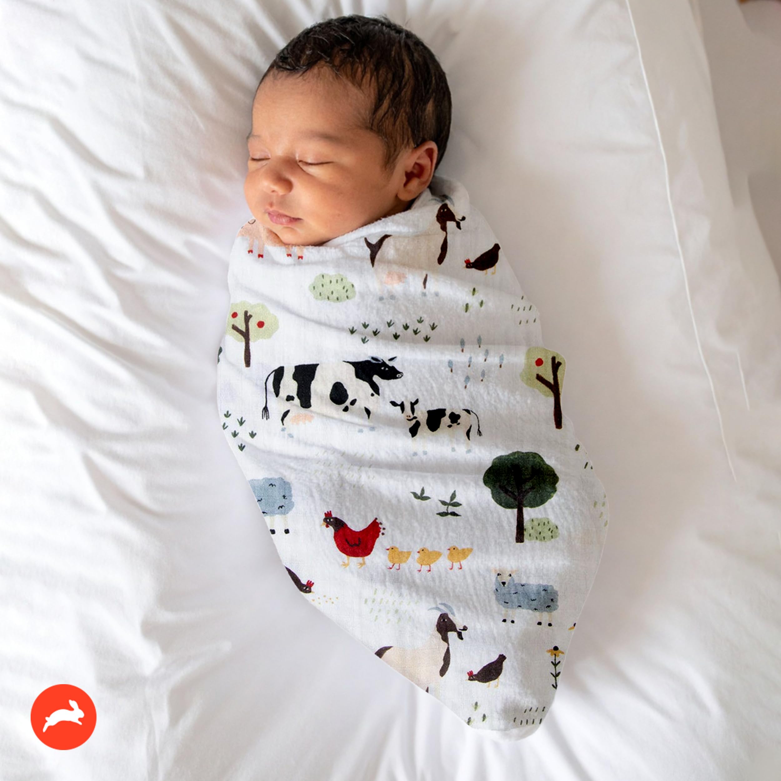 Red Rovr organic cotton swaddle highlights breathable, lightweight fabric for daytime cuddles.