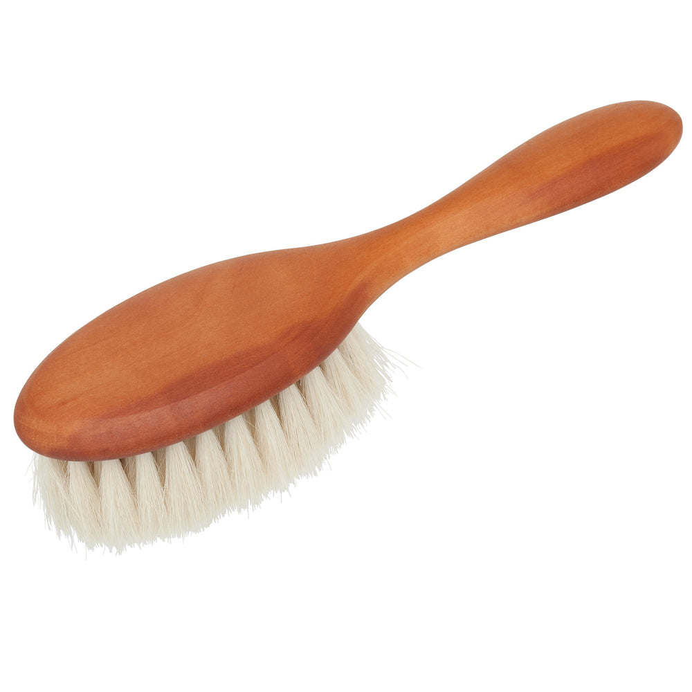 Redecker baby hairbrush with goat hair bristles for gentle, oil-distributing grooming.