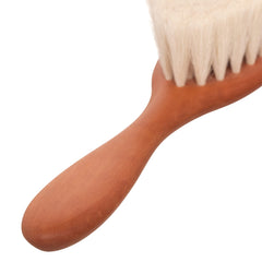 Redecker baby hairbrush side view highlighting compact 6-1/2 inch size.