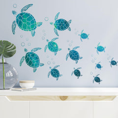 Refamaee watercolor sea turtle wall decal set for nursery walls with playful sea life imagery.