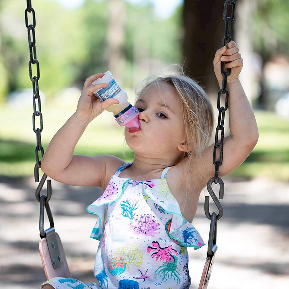 Refresh-a-Baby unicorn design spout adapter shown in use during a family outing.