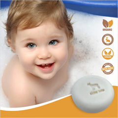 Relaxcation goat milk honey baby soap bar label highlights USA handmade quality.