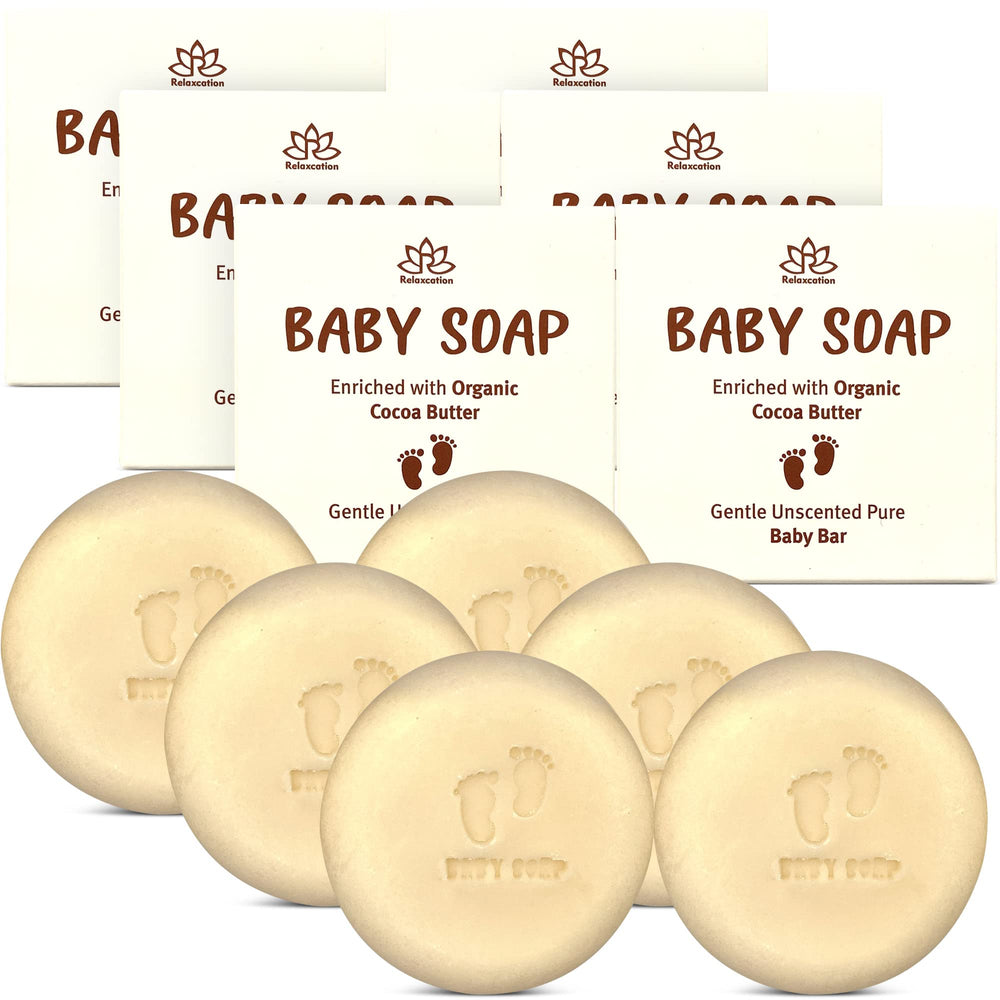 Relaxcation Organic Baby Soap Bar ingredients closeup shows pure coconut oil and cocoa butter for gentle cleansing.