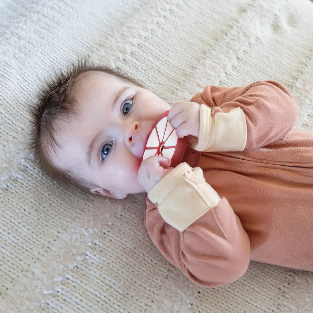 ReLIVE BPA-free silicone teether emphasizes safety and long-lasting use.