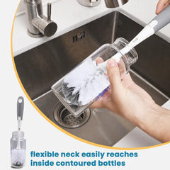 RIMAY cleaning glassware and bottles with the dual-bristle head.