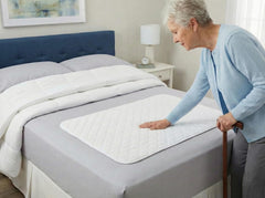 RMS Underpad waterproof barrier protects bedding from leaks.