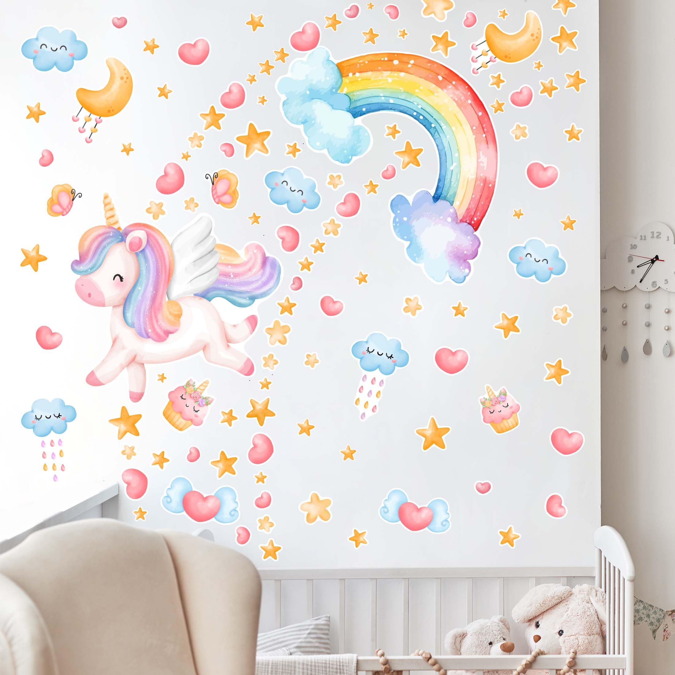 Robmoda ceiling decor with clouds and rainbows creates a dreamy ambiance in a kid's room