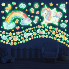 Robmoda glow-in-the-dark wall stickers illuminate a playroom with soft watercolor stars and rainbows
