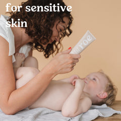 Roe Wellness baby-bottom care closeup showing fragrance-free formula