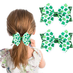 Roffiy enamel shamrock bow clip angled shot showcasing premium detailing.