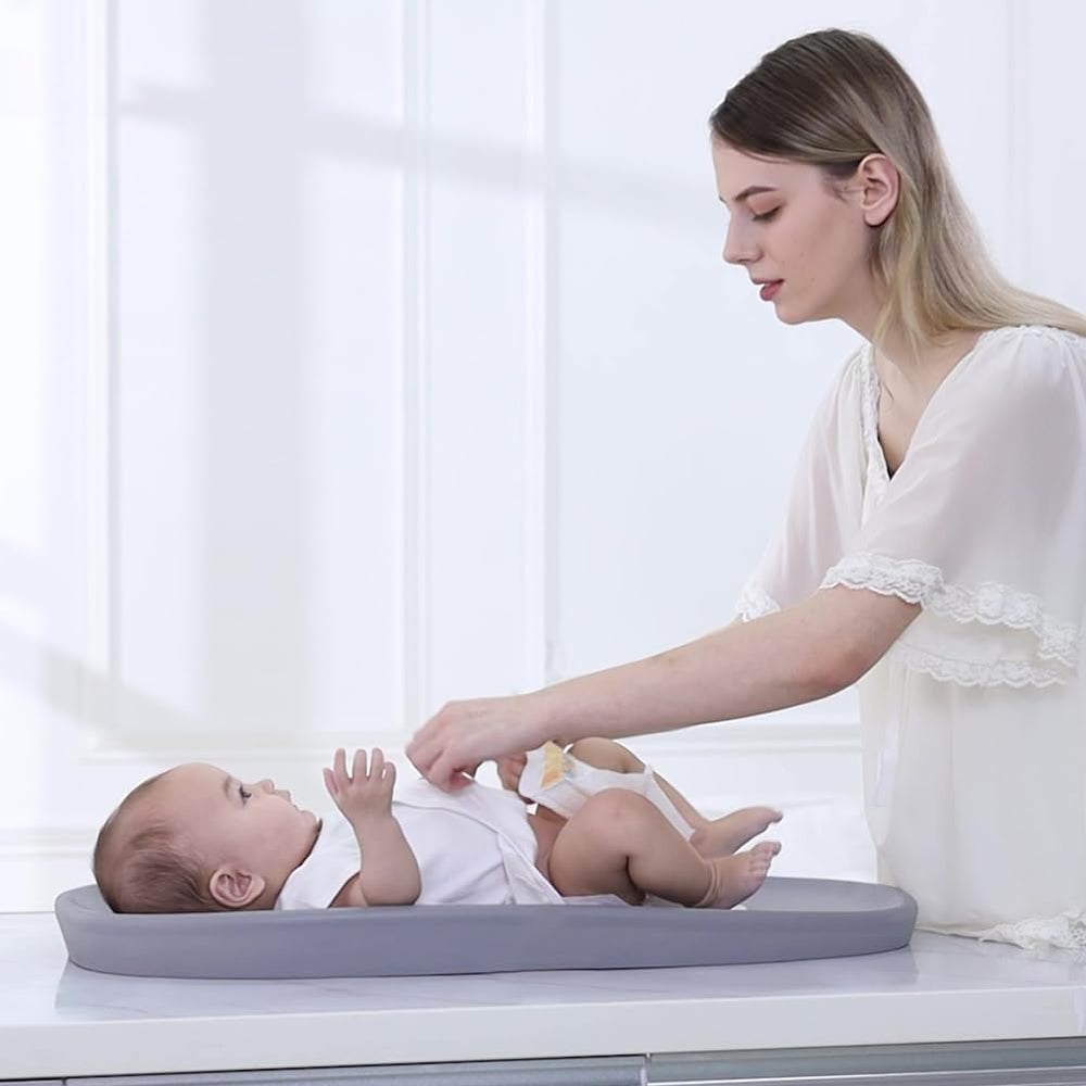 ROGSOUTH 30 by 15.6 inch changing pad size fits most changing tables.