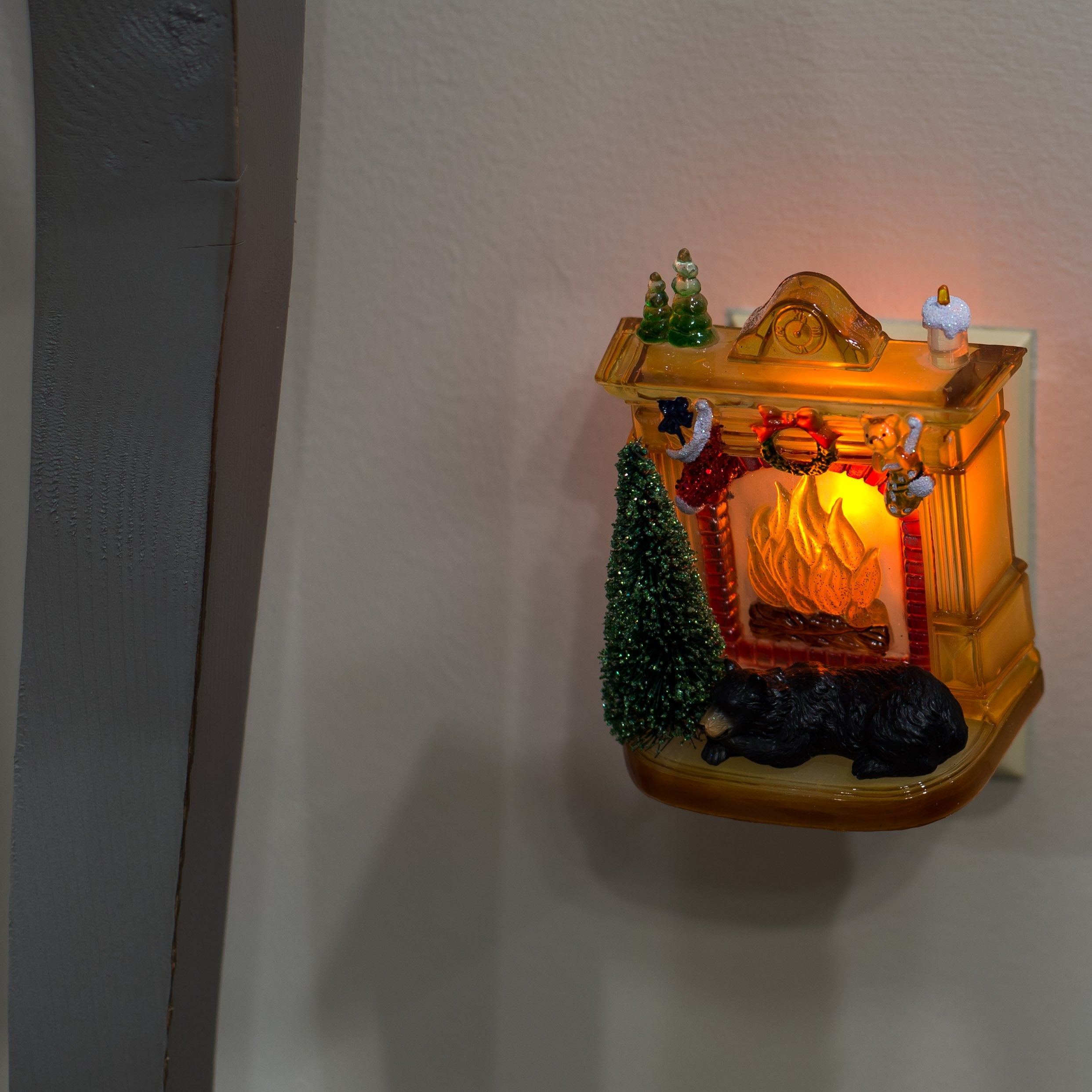 Roman Sleeping Bear night light with 360-degree swivel base for flexible outlet placement