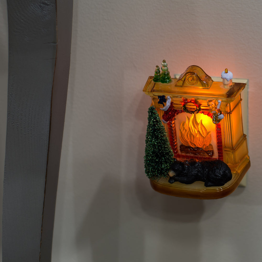 Roman Sleeping Bear night light with 360-degree swivel base for flexible outlet placement
