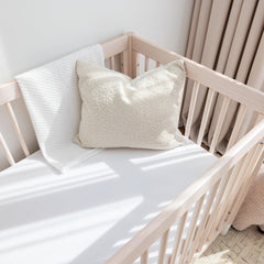 ROMY RO muslin crib sheet with elastic band fit on standard mattress securely.