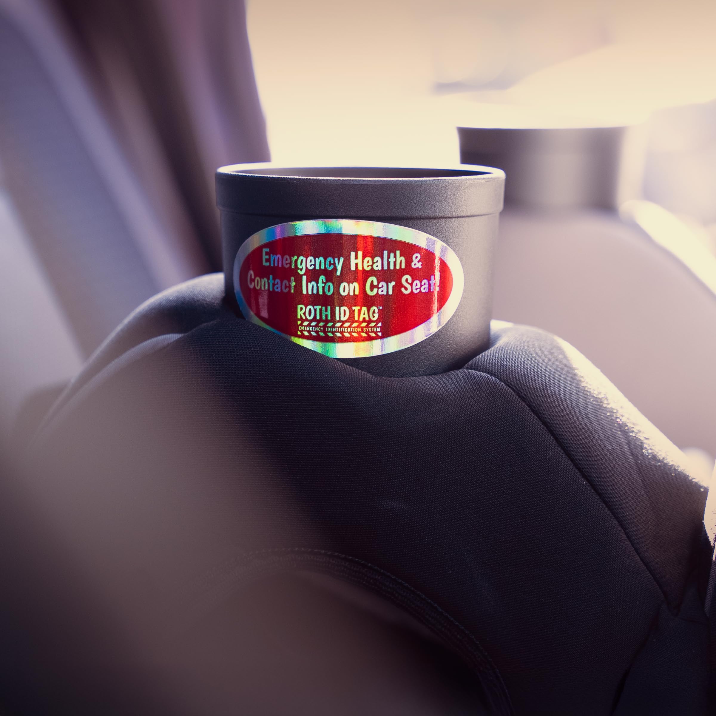 Roth ID Tag on car seat shows secure attachment and visibility.
