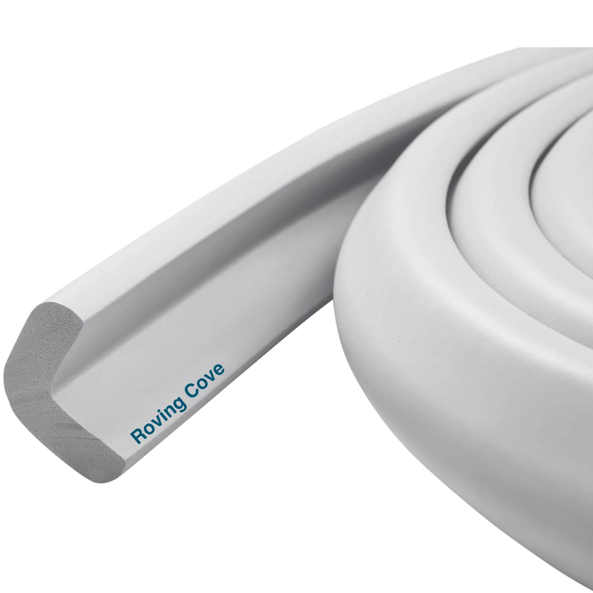 Roving Cove HeftyFit 6ft stone-grey edge guard on a sofa corner protecting children from sharp edges
