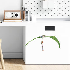 RoyoLam nursery wall sticker with frogs creates a playful play area.