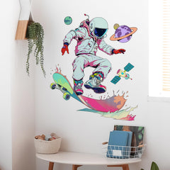 RoyoLam cool-skater-astronaut-wall-sticker adds playful space vibe to kids' room.