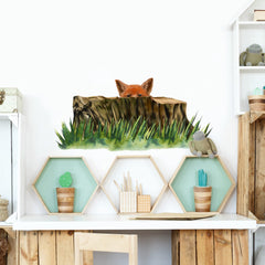RoyoLam fox behind stump decal brightens a kid's room with playful appeal
